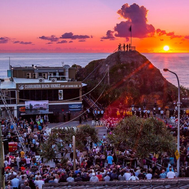 Painters Currumbin. photo taken at dusk overlooking the Currumbin-Surf-Club and Elephant-Rock with a crowd of people all around